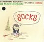 Text: "Socks", "A Christmas Album by JD McPHERSON", "Stereo full spectrum sound".

Illustration eines Kindes mit Socken.