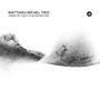 "MATTHIEU MICHEL TRIO", "SPEED OF LIGHT IN SLOW MOTION". Oben rechts ein rundes Logo. Schwarze Pinselstriche auf Weiß.