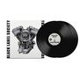 "BLACK LABEL SOCIETY", "THE BLESSED HELLRIDE". Ein Motorblock mit einem Totenkopf in der Mitte. Vinyl-Schallplatte daneben.