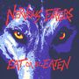 "Nervous Eaters" und "Eat or Be Eaten" in leuchtend roter Schrift. Illustration eines Wolfsgesichts mit intensiven Augen.