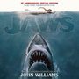"50th Anniversary Special Edition," "JAWS" in großem Text, unten "Music Composed & Conducted by John Williams." Ein Hai schwimmt unter einer schwimmenden Person.