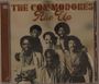 "The Commodores" und "Rise Up" in brauner Schrift, darunter ein Schwarz-Weiß-Bild von sechs lächelnden Männern.