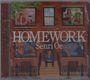 „HOMEWORK Senri Oe“ steht groß auf einem Backsteingebäude. In den Fenstern sind Musiker und Tonstudios zu sehen.