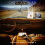 "CHRIS ANTBLAD", "COLLECTED WORKS - VOLUME 2". Innenansicht eines Autos mit CDs und einer Wüstenstraße voraus.