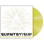 "BURNT BY THE SUN" oben, "THE PERFECT IS THE ENEMY OF THE GOOD" unten. Graue Strahlen, gelbe Schallplatte.