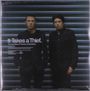 Text: "It Takes a Thief. The Very Best of Thievery Corporation." Zwei Männer stehen vor einem gestreiften Hintergrund.