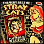 „STRAY CATS RUMBLE IN BRIXTON“. Es zeigt eine Illustration von Katzenfiguren und eine Frau im Retro-Stil.