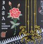 „IATA THE HORROR SHOW“, rosa Rose, gelbes Ornament, Benzinkanistersymbol.