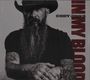 Der Text lautet "CODY JINKS" und "IN MY BLOOD". Ein Mann mit Vollbart und Hut, tätowierte Arme, ernstes Gesicht.