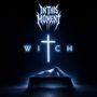 "In This Moment" steht oben, "WITCH" darunter mit einem leuchtenden Kreuz als "T". Darunter eine verhüllte Gestalt auf einem Tisch.