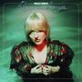Text: "Molly Burch Romantic Images". Eine Person mit blonder Frisur und rotem Lichtschein, steht halb im Wasser.