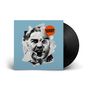 Text "MASSEN DEFEKT" in einer orangefarbenen Blase auf zerrissenem Porträt eines schreienden Mannes, Vinyl im Hintergrund.