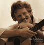 „Kris Kristofferson - The Austin Sessions“. Ein lächelnder Mann mit Gitarre in nachdenklicher Pose.