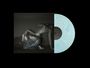 Hellblaue Vinylschallplatte mit einem Cover, das zwei ineinander verschlungene Körper zeigt.