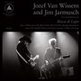 Jozef Van Wissem und Jim Jarmusch, Album "Bocca di Lupo", Lieder siehe Seite A und B; zwei Musiker mit Gitarren unter Scheinwerfern.