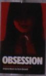 "OBSESSION" und "Original Music by York Bernow". Silhouette einer Frau mit schwarzem Haar und rotem Hintergrund.