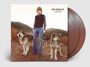 Text: "BEN KWELLER On My Way". Person in Jeans mit zwei Wölfen, Berglandschaft im Hintergrund. Vinyl-Schallplatten daneben.