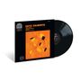 Texte: "Getz/Gilberto", "Stan Getz", "Joao Gilberto", "featuring Antonio Carlos Jobim". Schwarzes Album mit orangefarbenem Kunstwerk.