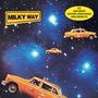 Text: „MILKY WAY“, „FEAT. RANDY BRECKER, LENNY WHITE...“. Orange Taxis schweben vor einem Sternenhimmel.