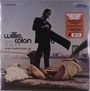 Das Cover zeigt "Willie Colon", "cosa nuestra", "canta: héctor la voe". Eine Person steht mit einem Saxophon auf einem Steg.
