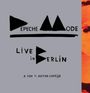 "Depeche Mode Live in Berlin. A film by Anton Corbijn." Schwarzer Text auf grauem Hintergrund. Links Logo-Elemente.