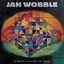 Text: "Jah Wobble", "A Brief History of Now". Eine bunte, abstrakte Illustration mit geometrischen Mustern.