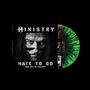 "MINISTRY" und "HATE TO GO TAKE OUT OR DELIVERY" in großer Schrift. Dunkles Gesicht mit Brille, grünes Vinyl mit schwarzem Muster.