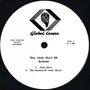 "Global Caress" Logo mit Kopf; Texte: "The Jack Shit EP", "Arsene", Titel: "Jack Shit", "The Breeze Of Your Shirt", Seite 1, 33.3 RPM.