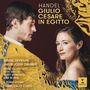 Text: "HANDEL GIULIO CESARE IN EGITTO". Namen erscheinen unten. Links ein Mann, rechts eine Frau, goldene Muster. Erato-Logo.