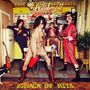 "The Darkness" oben, "Crock of Hits" unten. Vier Männer in bunter Kleidung posieren in einer Retro-Küche.
