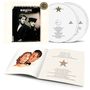 "Roxette Pearls of Passion". Zwei CDs, eine Liste von Liedtiteln und ein Heft mit einem Retro-Paar illustriert.