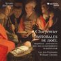 Texte: Charpentier Pastorales de Noël. Illustration: Eine Gruppe Menschen neben einem schlafenden Kind in einer Krippe.