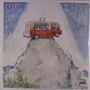 Text: "SCARY GOLDINGS" links oben, "The HOLY ENCHILADA" rechts oben. Illustration: Roter Truck auf Bergspitze.