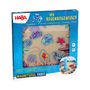 "Der Regenbogenfisch" in Gelb, "Magnetspiel Vario" in Blau. Verpackung zeigt bunte Meeresbewohner als Puzzle.