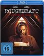 „ROUGH DRAFT“, „WRITTEN IN BLOOD“. Ein Mann mit Bart und grauem Haar sitzt vor einer Schreibmaschine. FSK 16 Logo.