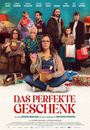 "Das perfekte Geschenk" steht unten. Eine Gruppe von Menschen hält Geschenke. Eine Frau sitzt mit einer Box und einem Gummientchen.