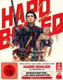 "Hard Boiled" in großen roten Buchstaben. Illustration: Mann mit Baby, Schrotflinte und Patronen. FSK 18 Hinweis.