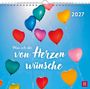 „Was ich dir von Herzen wünsche“ und „2027“. Herzförmige Ballons in verschiedenen Farben gegen blauen Himmel.