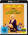 Titel: "Manche mögen's heiß". Drei Personen in auffälliger Kleidung, darunter eine Frau in violettem Kleid.