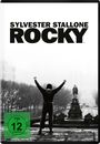 Oben steht "SYLVESTER STALLONE ROCKY". Darunter hebt eine Person in Trainingsanzug triumphierend die Arme.
