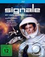 „Signale – ein Weltraumabenteuer“ mit Gojko Mitic. Ein Astronaut im Raumanzug, Raumschiffe im Hintergrund, FSK 12.