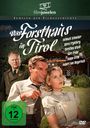 "Das Forsthaus in Tirol", Schauspieler-Namen, FSK 12 Logo. Paar vor Berghütte, Mann im Hintergrund. Vintage-Stimmung.