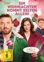 Text: "Ein Weihnachten kommt selten allein", "Chandler Massey", "Katherine Barrell", "FSK ab 6 freigegeben". Drei Personen vor Weihnachtsschmuck.