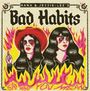 Text: "Hana & Jessie-Lee's Bad Habits". Illustration: Zwei Frauen in Flammen, eine mit rotem Hut. Vintage-Stil.