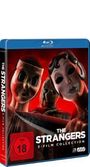 "The Strangers 3-Film Collection. FSK 18. Drei Personen mit bedrohlichen Masken, zwei in Nahaufnahme."