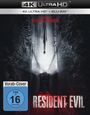 Text: "4K ULTRA HD", "BLU-RAY", "VOM REGISSEUR VON WEAPONS UND BARBARIAN", "RESIDENT EVIL", "Vorab-Cover", "FSK ab 16".  
Scene: Eine dunkle Straße im Wald mit Auto und Schatten.