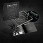 Albumcover "REINKAΩS" von Dissection. Schwarzes CD-Cover mit symbolischem Kreis und Booklet mit Drachen-Illustration.