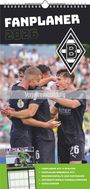 "Fanplaner 2026", "Vorjahresabbildung", "Fanplaner mit 4 Spalten", Fußballer in dunklen Trikots feiern.