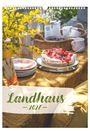"Landlust" oben, "Landhaus 2027" unten. Tisch mit gelben Blumen, Obstkuchen, Geschirr und Tassen in gemütlicher Atmosphäre.