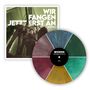 Ein Plattencover mit "WIR FANGEN JETZT ERST AN" von "BETONTOD" und eine Vinyl-Schallplatte in bunten Segmenten.